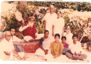 Yogiji with Sri Dwaraknath, Sow. Sandhya, Nivedita, Vivek, their cousin Devaki and others